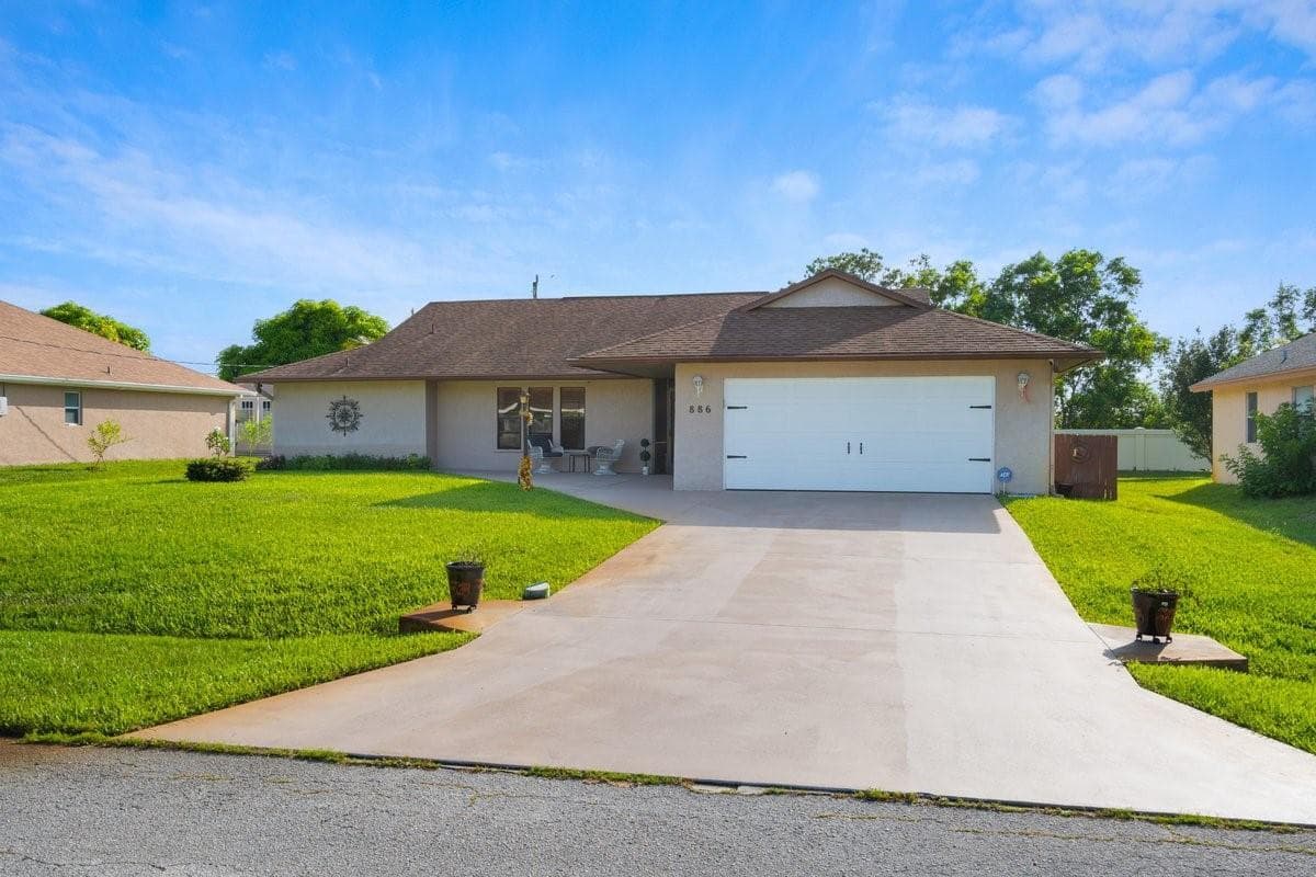 886 S E O'Donnell Lane, Port St. Lucie FL 34983 photo 3