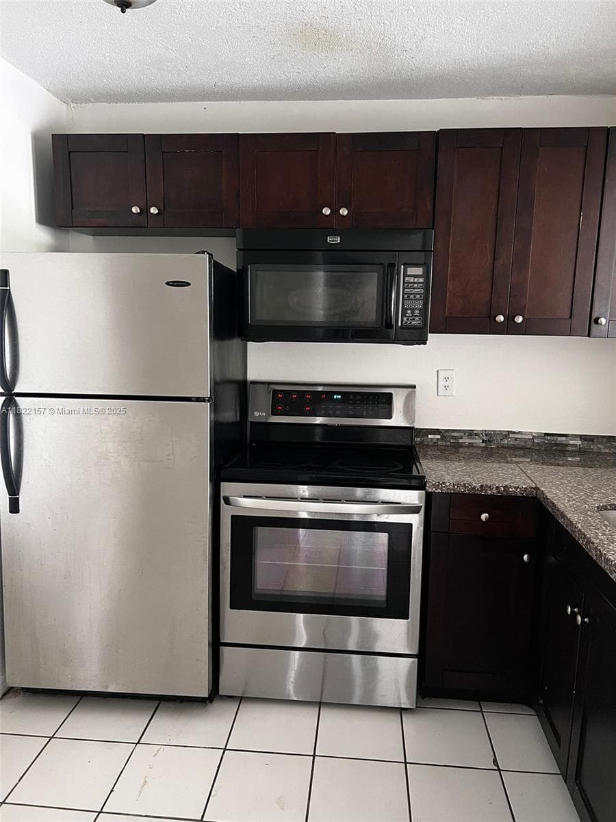 498 NW 165th St Rd # D303, Miami FL 33169