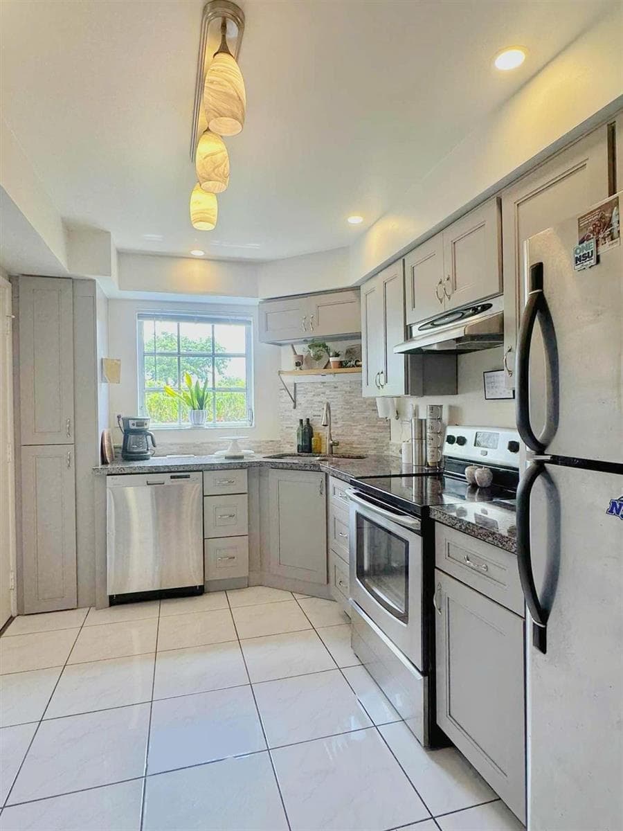3475 Broken Woods Drive # 101, Coral Springs FL 33065 photo 2