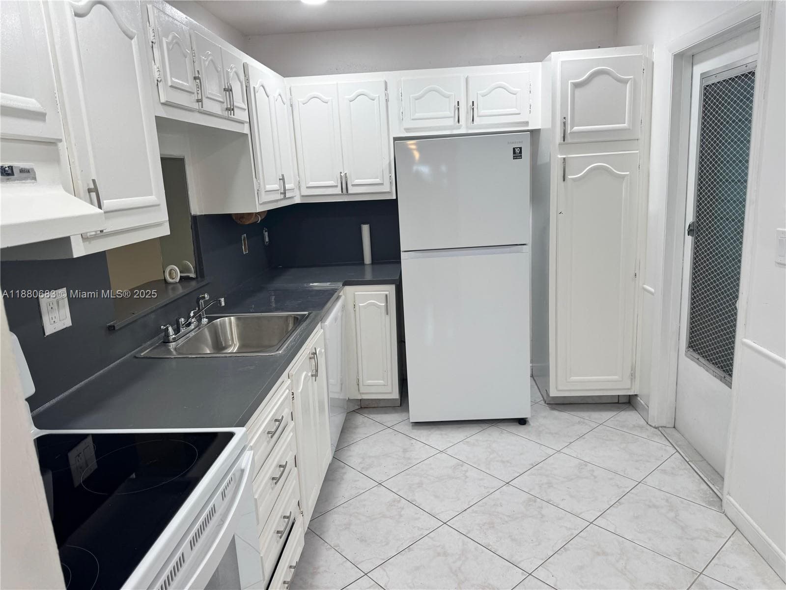 4141 NW 44th Ave # 117, Lauderdale Lakes, FL 33319 photo 2