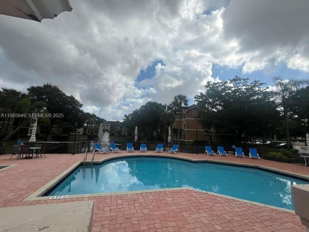8821 Wiles Rd # 102, Coral Springs FL 33067 photo 2