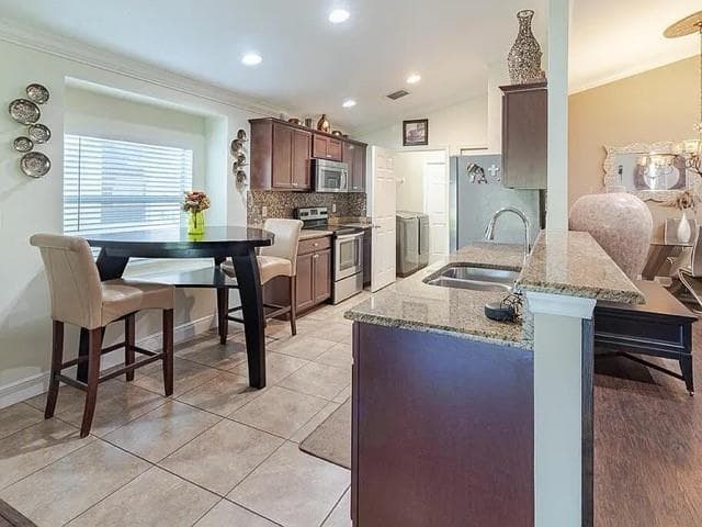 9446 Windrift Circle, Fort Pierce FL 34945 photo 3