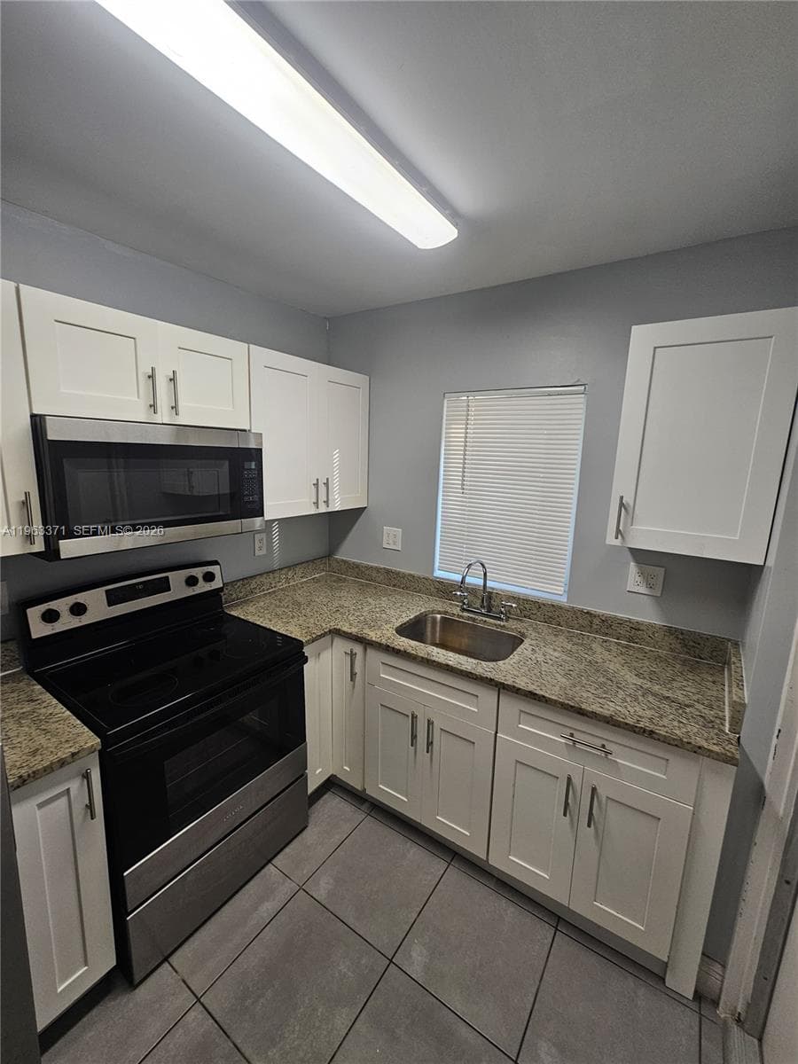 1128 NW 101st St, Miami FL 33150 photo 3