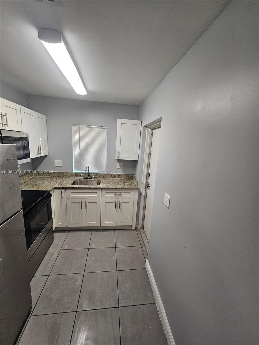 1128 NW 101st St, Miami FL 33150 photo 4