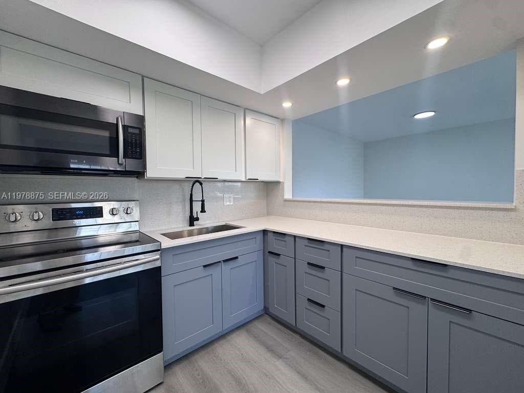 455 Golden Isles Dr # 203, Hallandale Beach FL 33009 photo 2