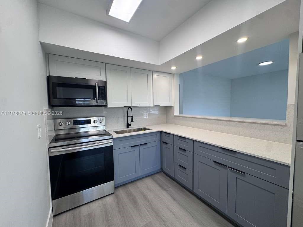 455 Golden Isles Dr # 203, Hallandale Beach FL 33009 photo 4