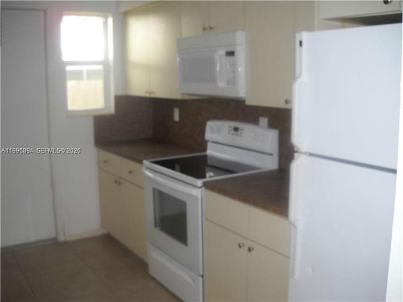 1040 92 ST # 3, Bay Harbor Islands FL 33154 photo 4