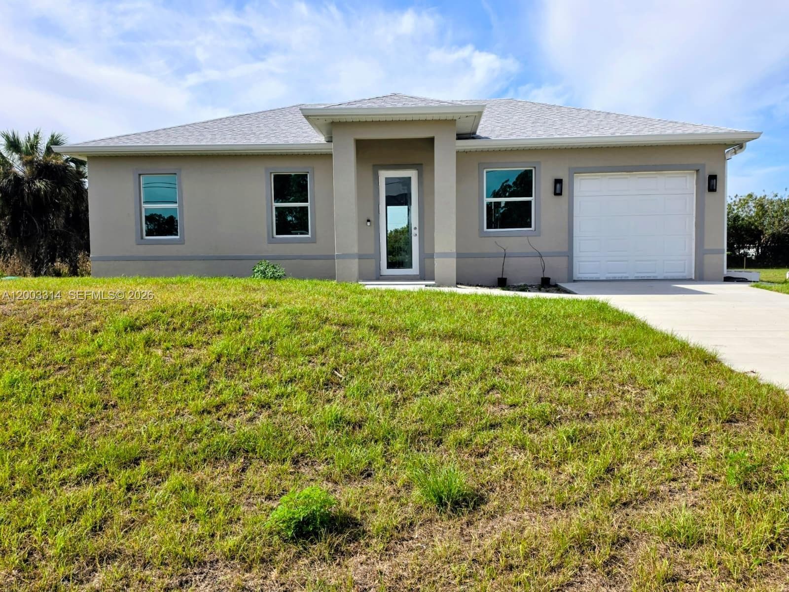 402 Harrison Dr, Lehigh Acres FL 33936