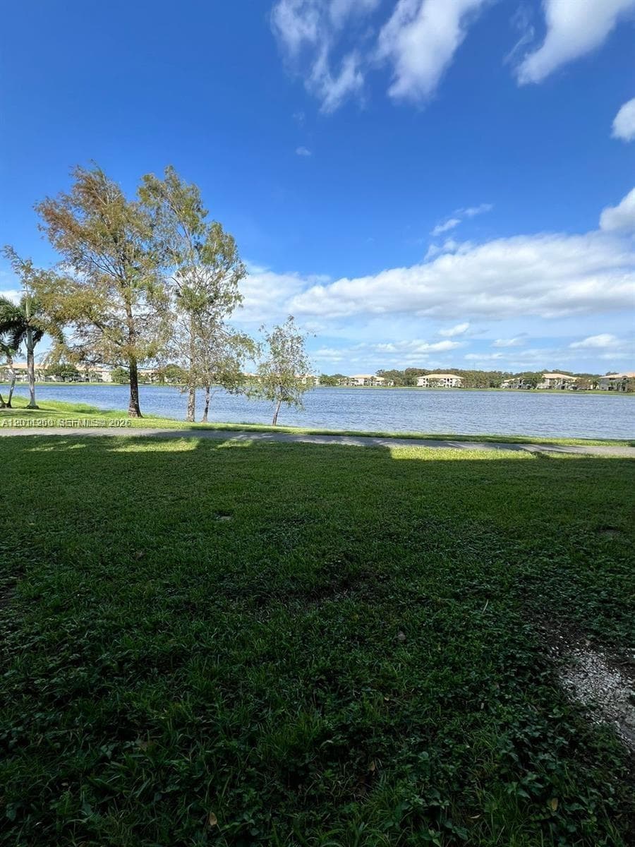 5065 Wiles Rd # 103, Coconut Creek FL 33073 photo 2