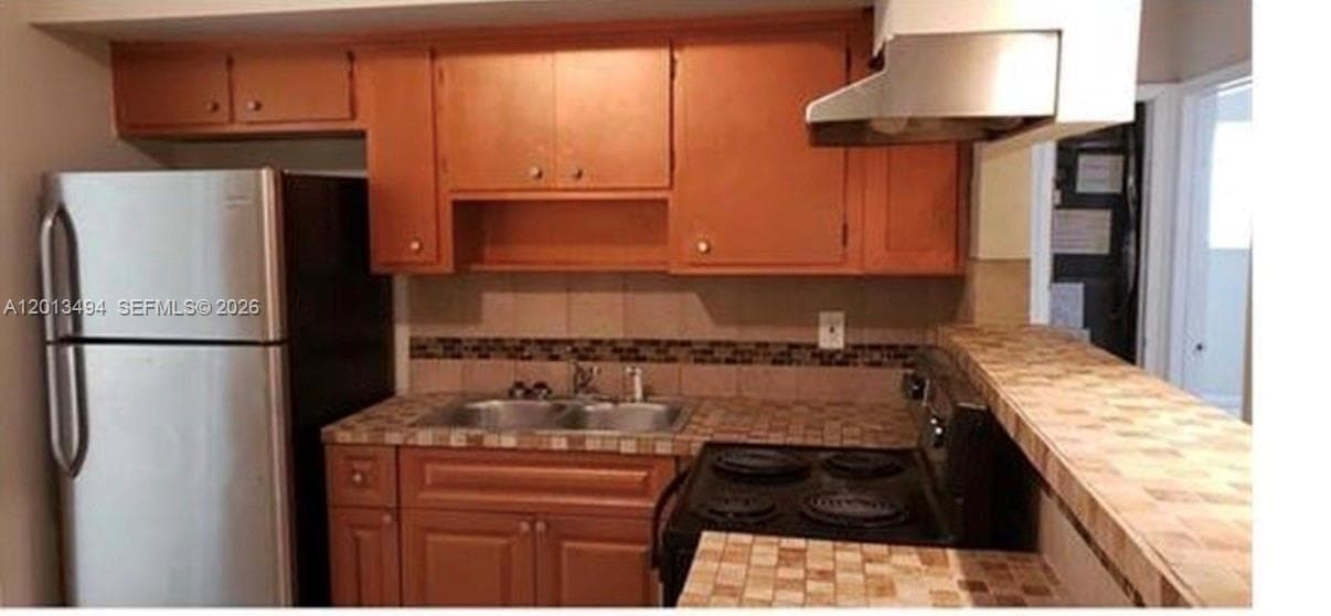 5631 SW 27th St, West Park FL 33023 photo 3