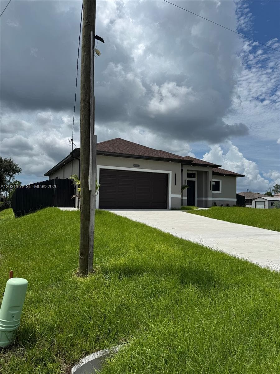 3115 2nd ST SW, Lehigh Acres FL 33976 photo 2