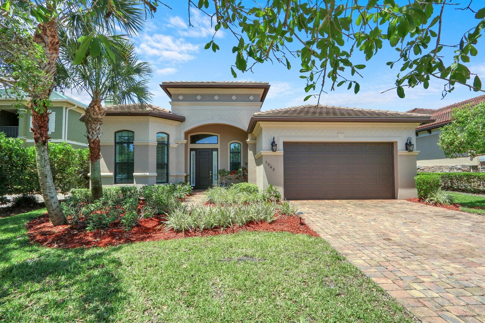 1042 NE Savanna Oaks Way, Jensen Beach FL 34957 photo 2
