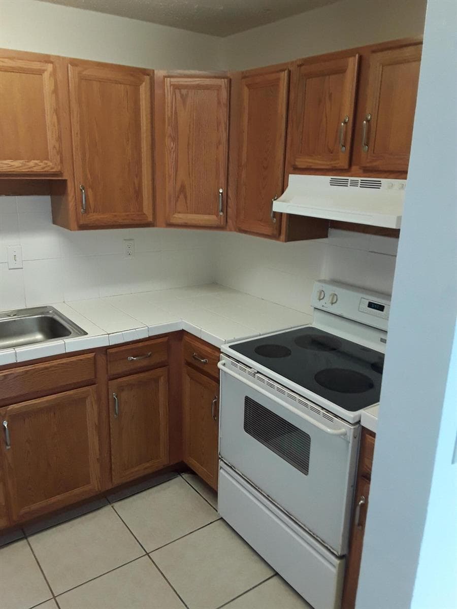 7664 Kimberly Boulevard # 1-3, North Lauderdale FL 33068 photo 2