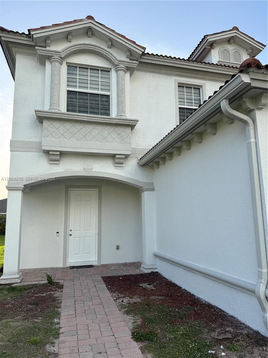 9135 Leatherwood Loop, Lehigh Acres FL 33936 photo 2