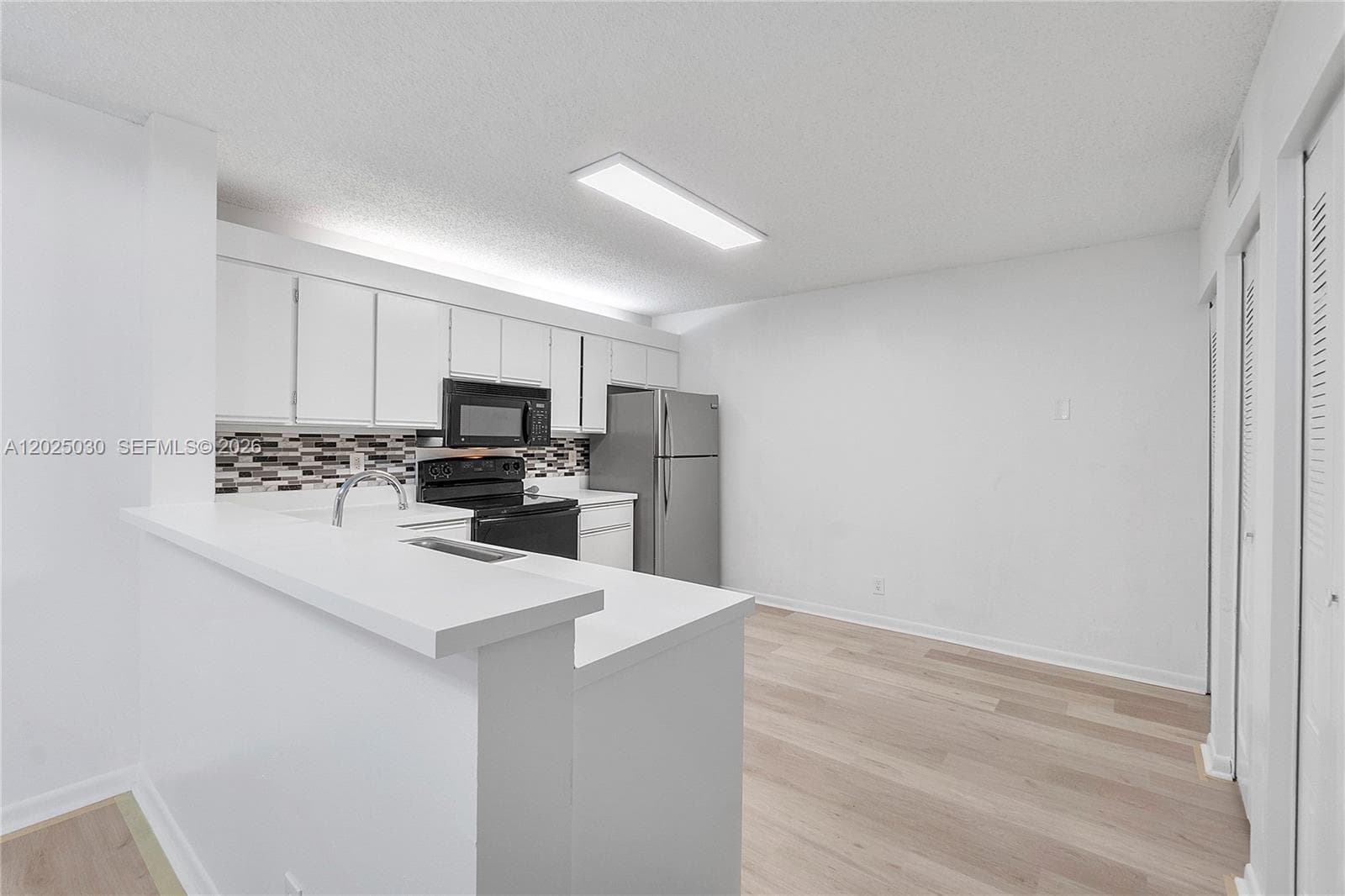 5661 Riverside Dr, Coral Springs FL 33067 photo 2