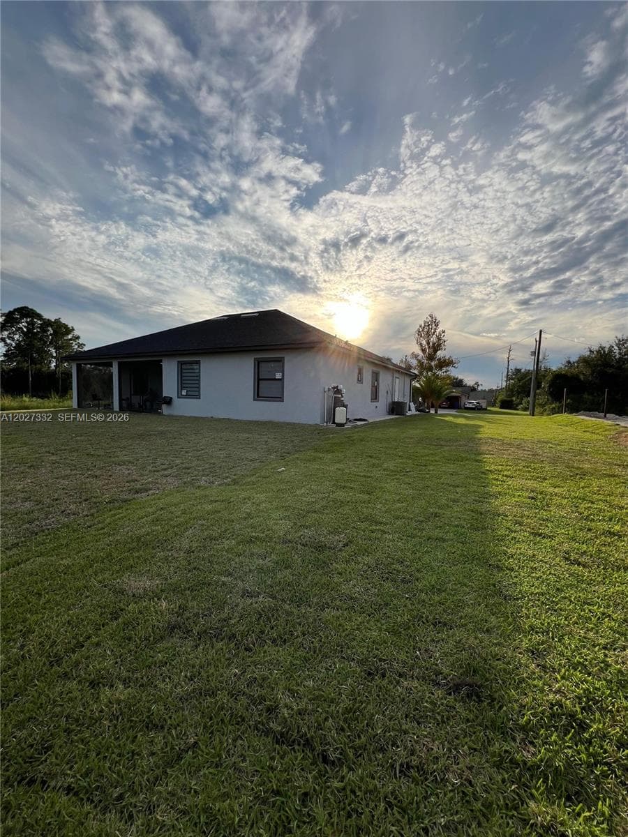 616 Maple Ave N, Lehigh Acres FL 33972 photo 4