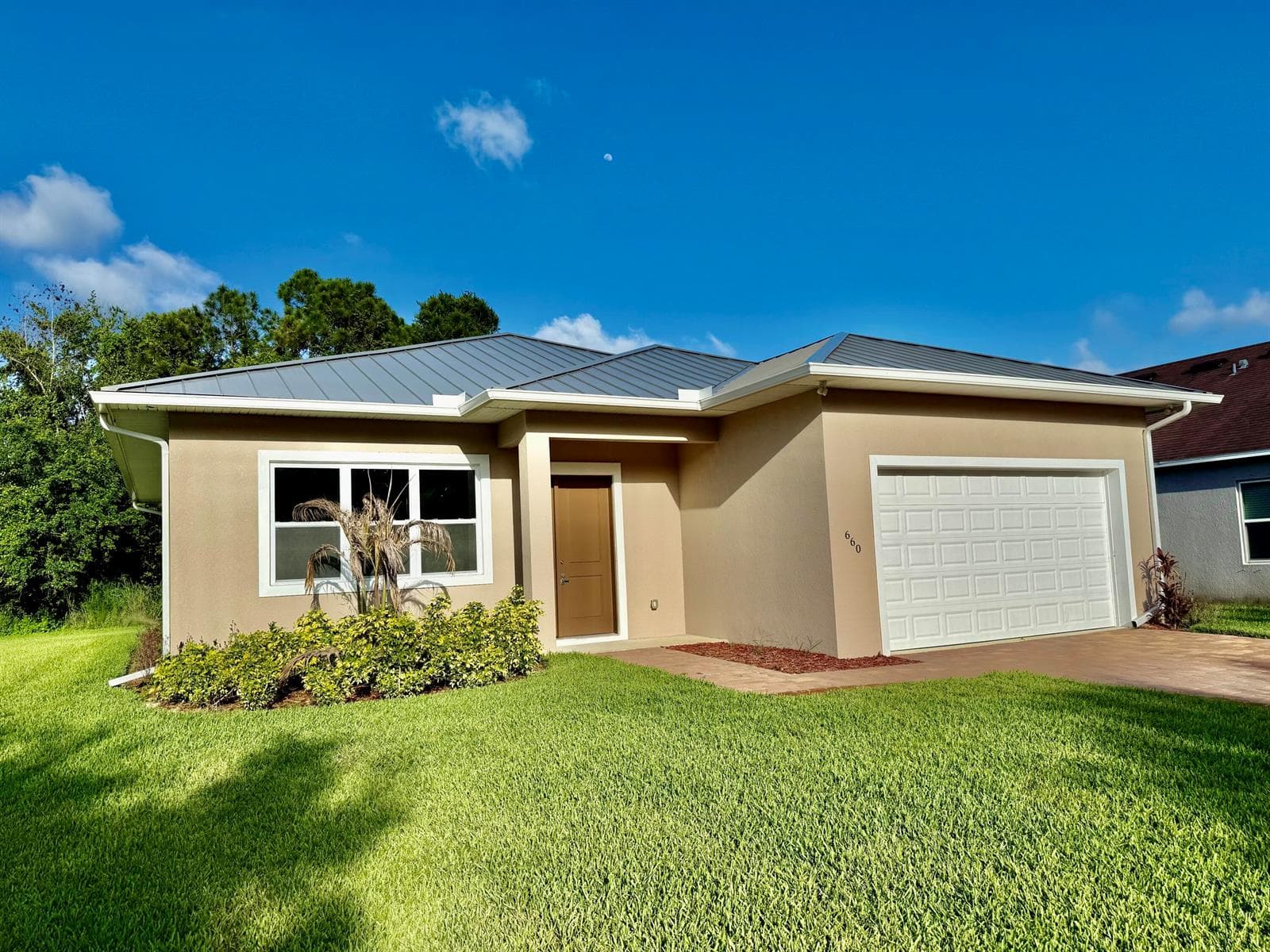 660 NE Moss Rose Place, Port St. Lucie FL 34983 photo 3