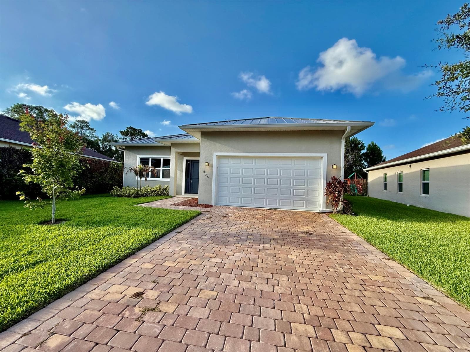 675 NE Moss Rose Place, Port St. Lucie FL 34983 photo 2