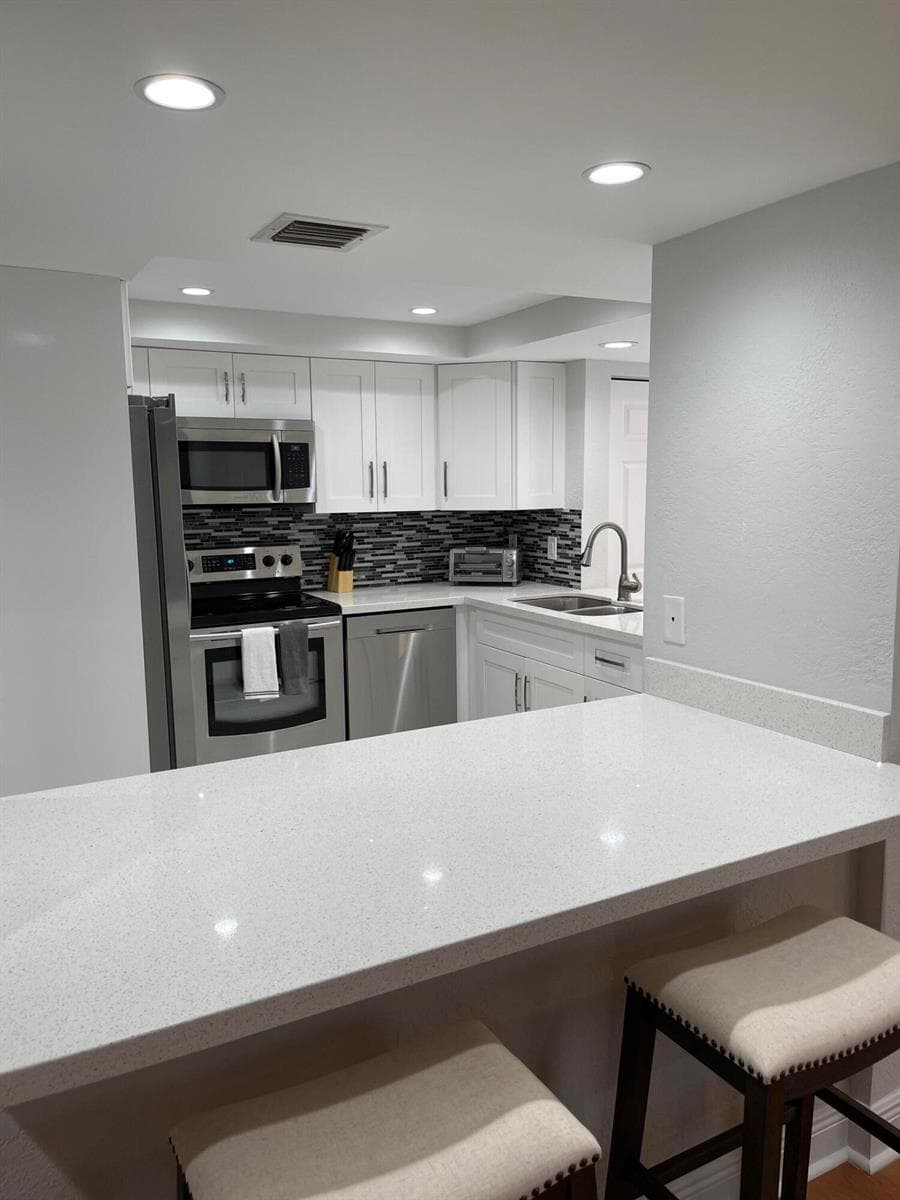 1660 Twelve Oaks Way # 203, North Palm Beach FL 33408 photo 4