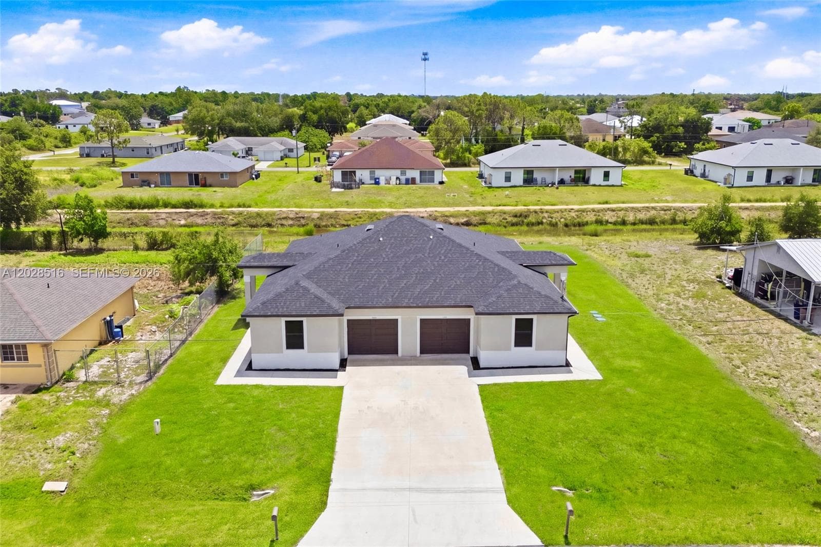 225/227 Hightower AVE S, Lehigh Acres FL 33973 photo 3