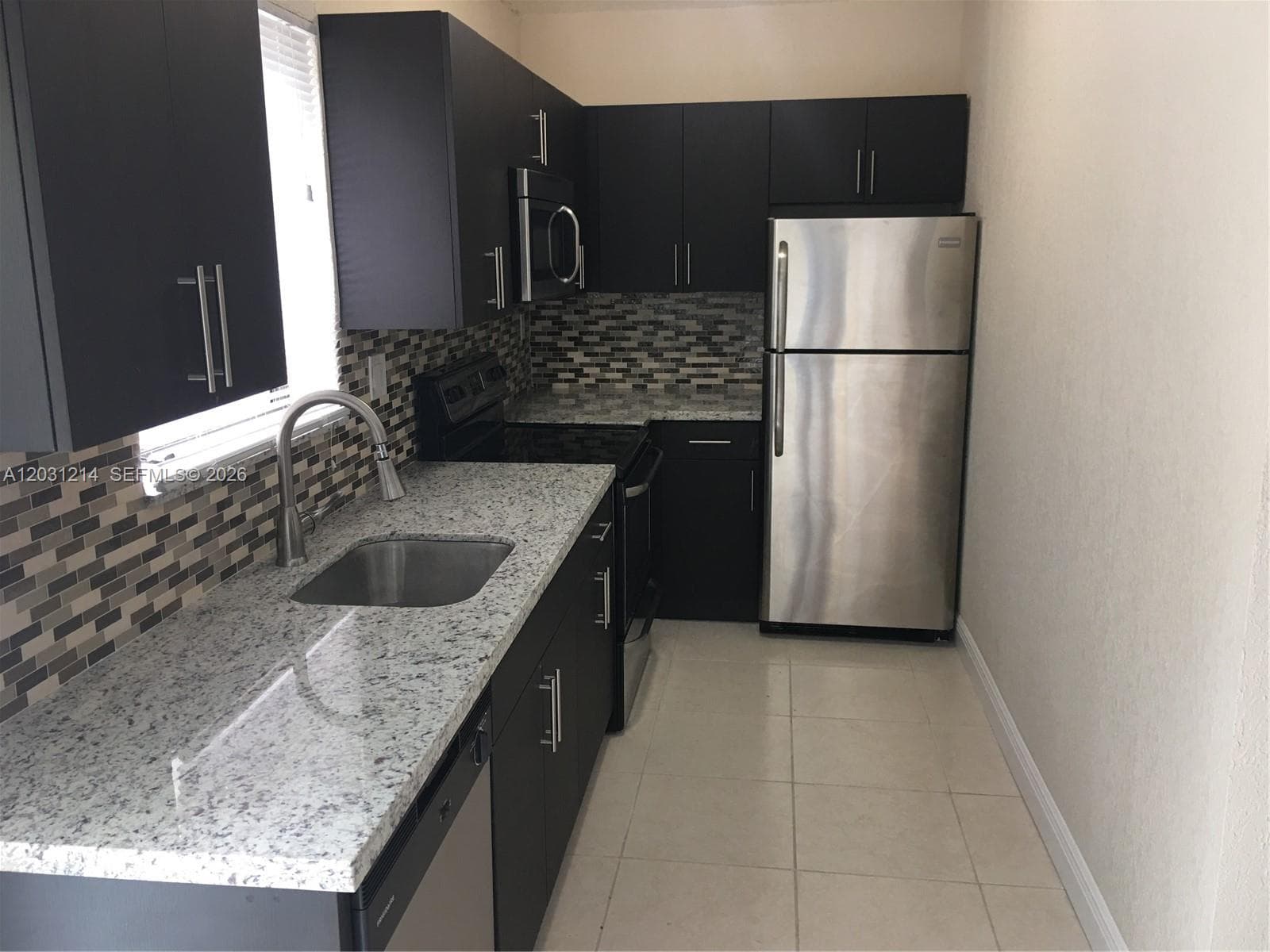 1594 NE 155th Ter, North Miami Beach FL 33162 photo 3