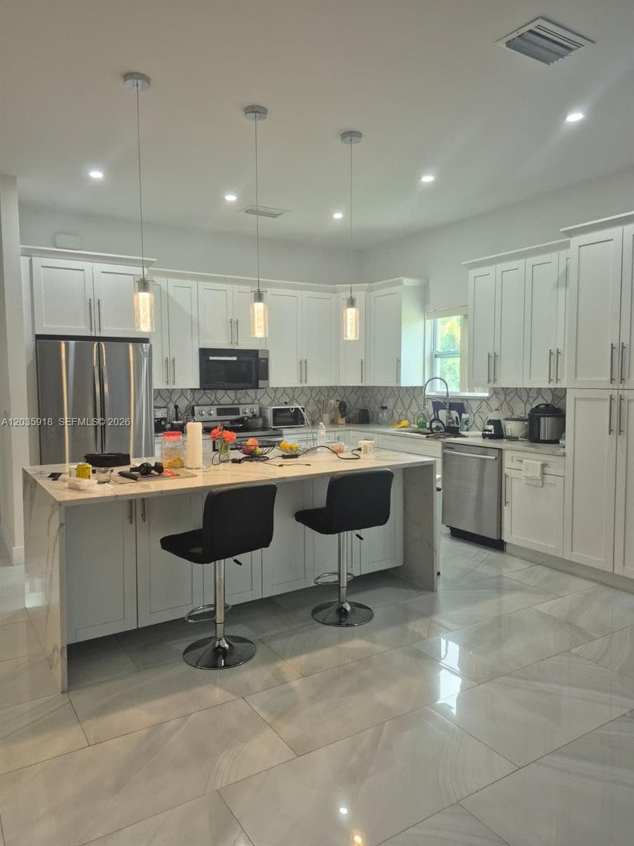 3642 32ND AVE SE, Naples FL 34117 photo 4