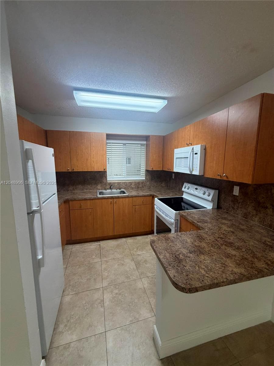 1650 W 44th Pl # 119, Hialeah, FL 33012 photo 2