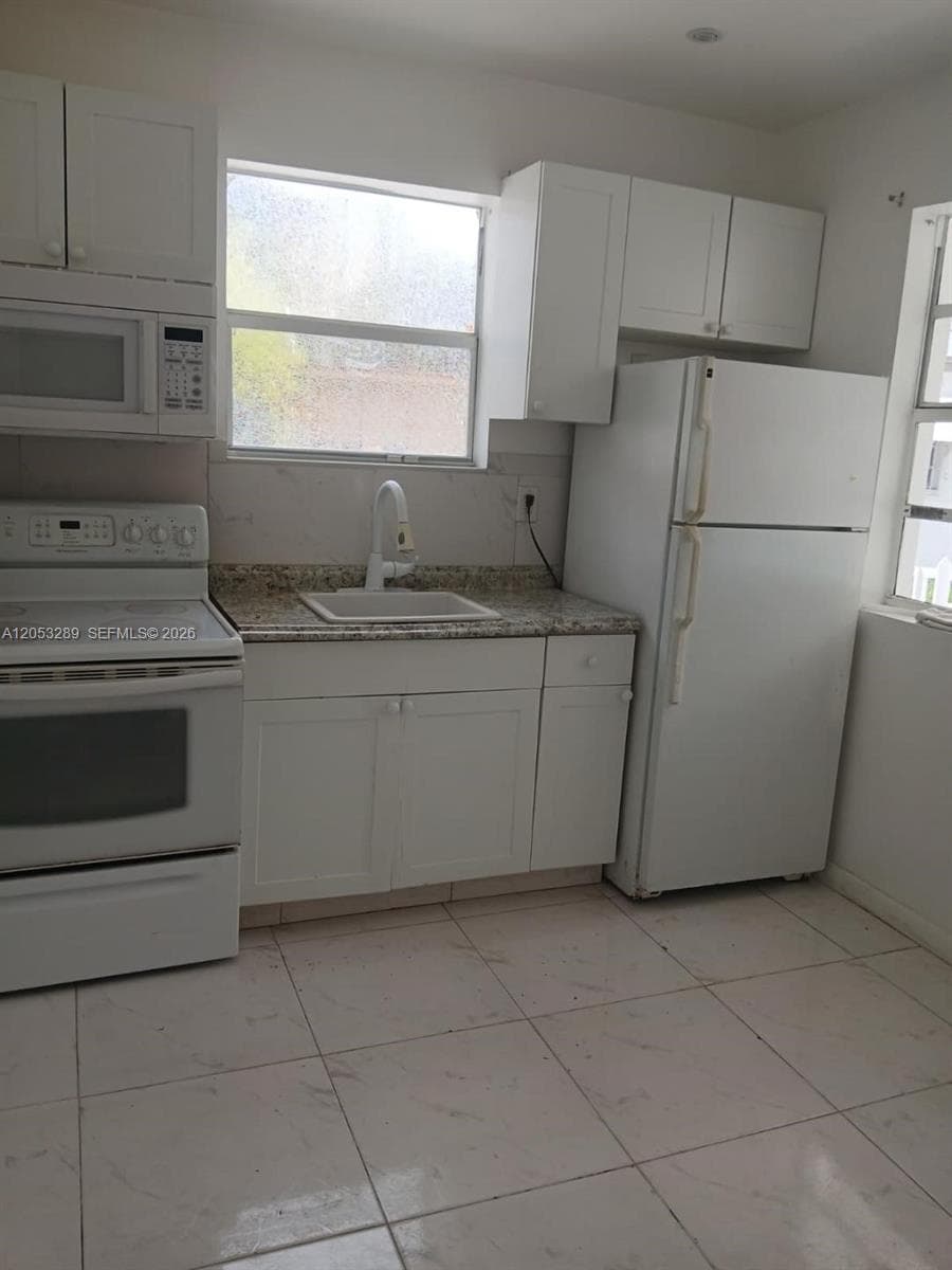 2311 NE 135 Th Ter, North Miami Beach FL 33181 photo 2
