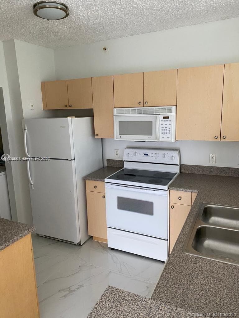 7980 N Nob Hill Rd # 102, Tamarac FL 33321 photo 3