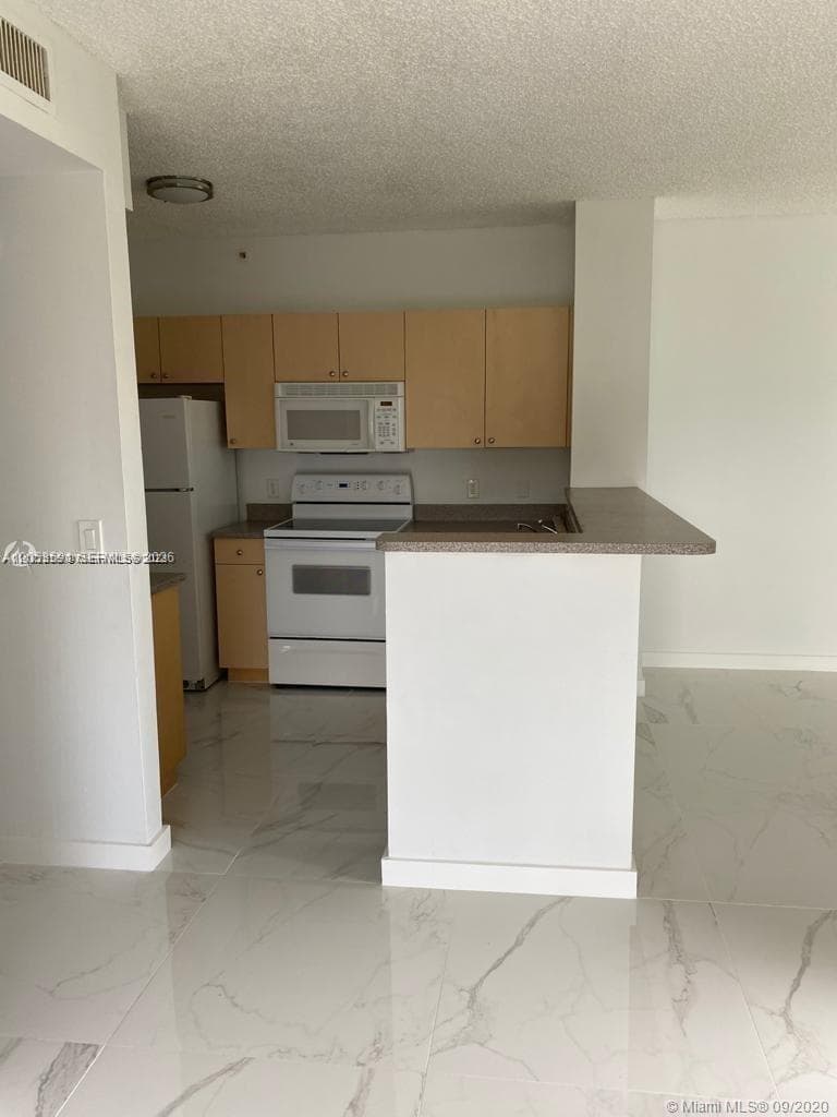 7980 N Nob Hill Rd # 102, Tamarac FL 33321 photo 4