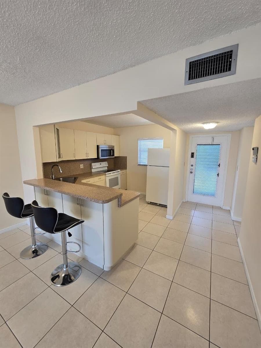 8321 SANDS POINT Boulevard # D306, Tamarac FL 33321