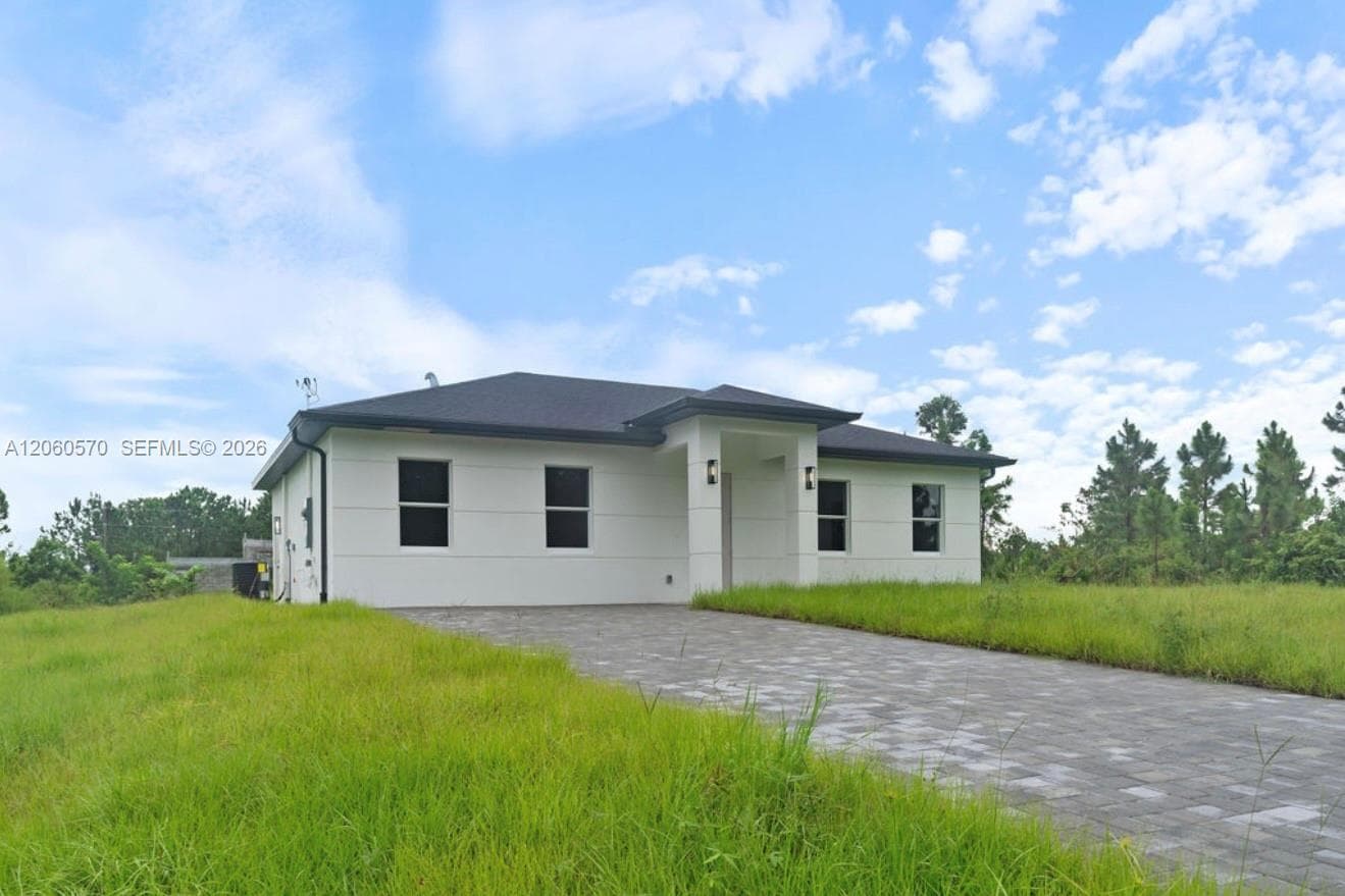 708 PEACOCK AVE, Lehigh Acres FL 33974 photo 2