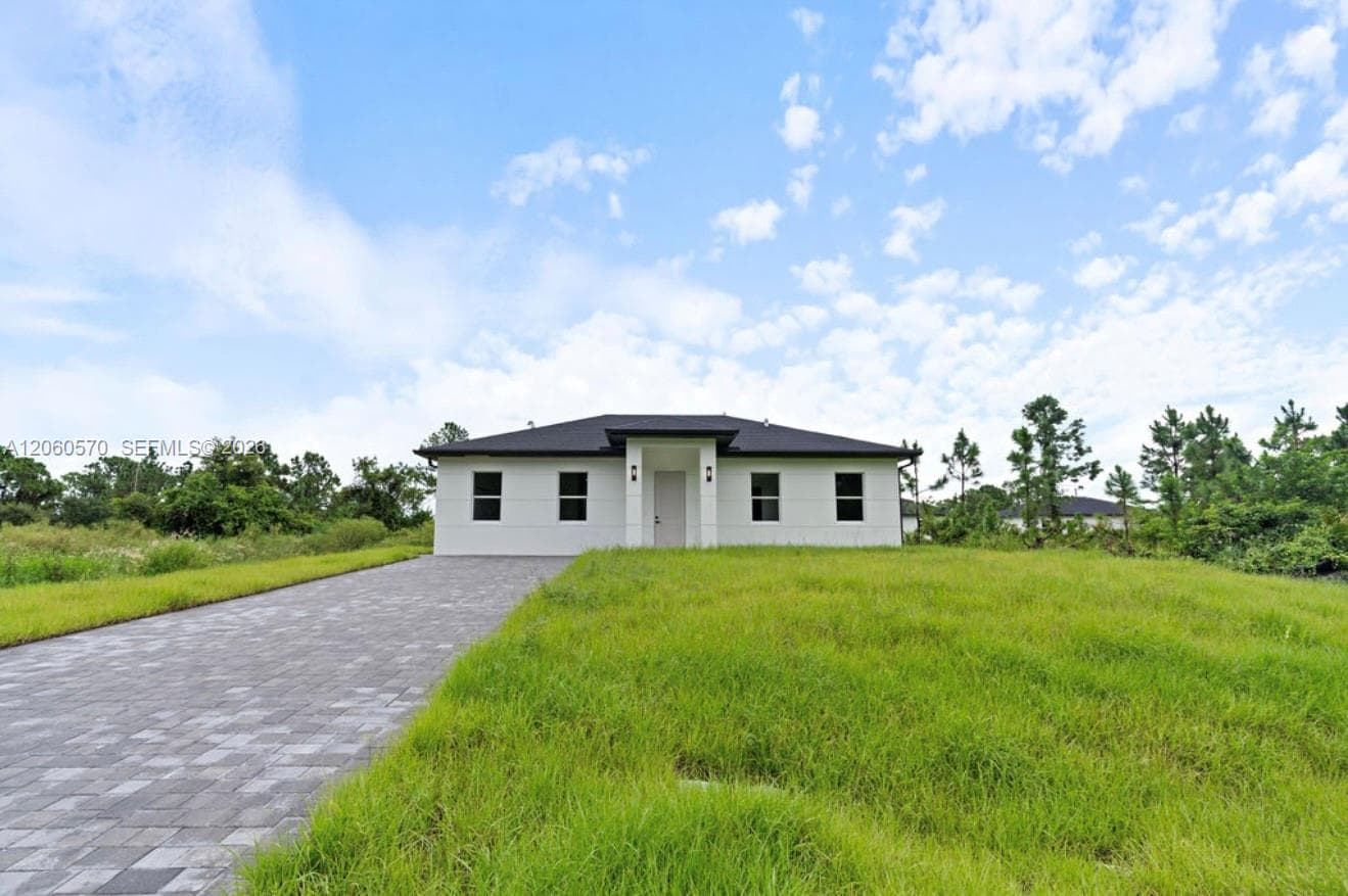 708 PEACOCK AVE, Lehigh Acres FL 33974
