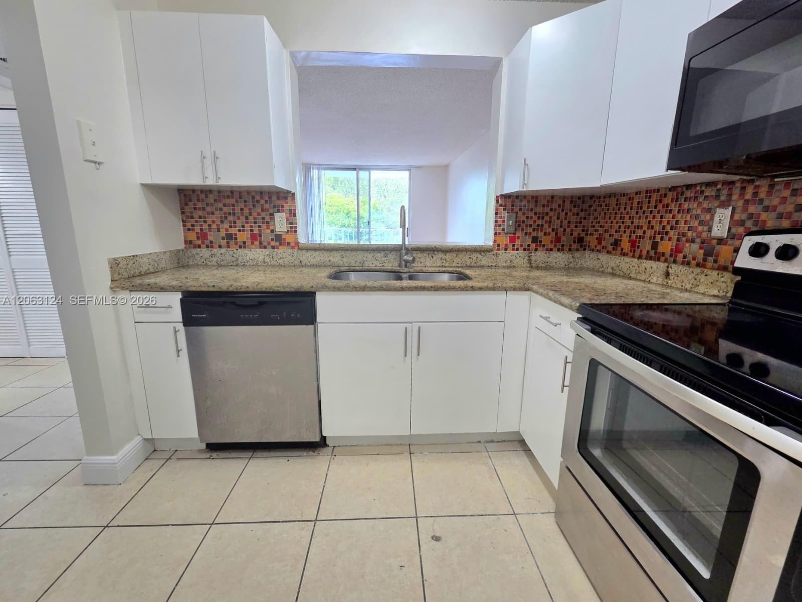 482 NW 165th St Rd # A306, Miami, FL 33169