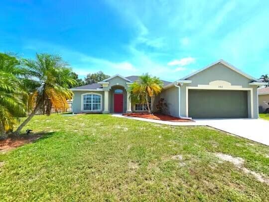 302 NE Greenbrier Avenue, Port St. Lucie FL 34983