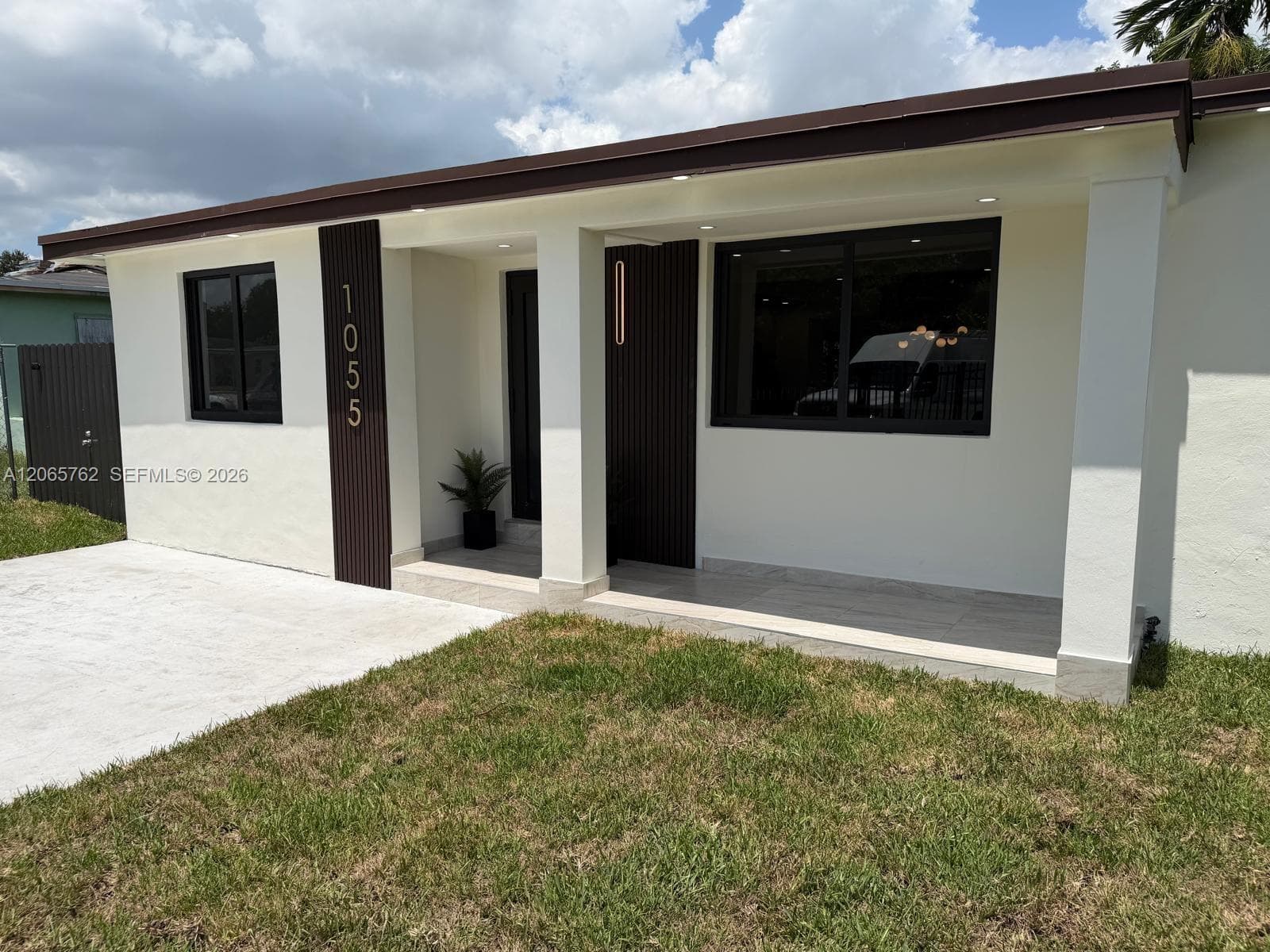 1055 NW 143rd St, Miami FL 33168 photo 2