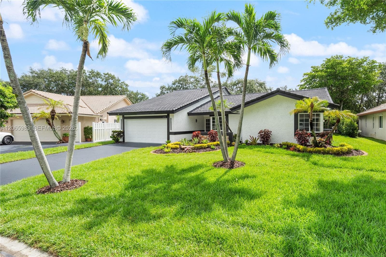 695 NW 107th Ln, Coral Springs FL 33071 photo 2