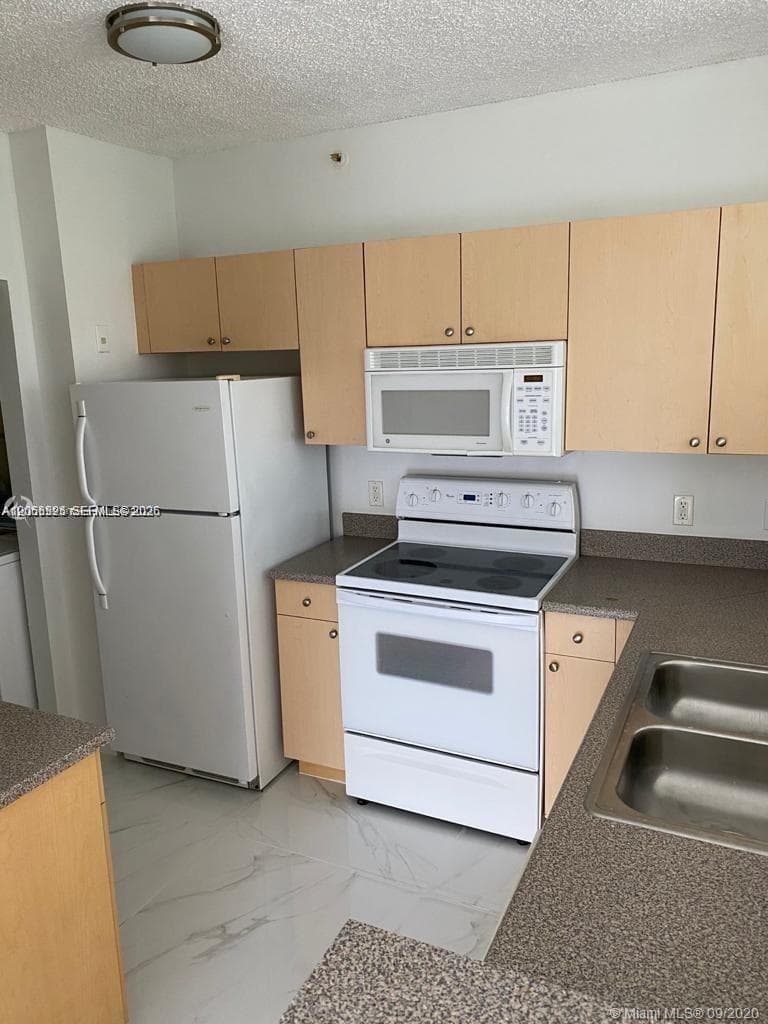 7980 N Nob Hill Rd # 102, Tamarac FL 33321 photo 3