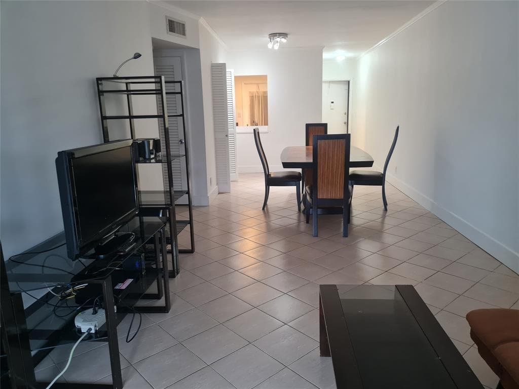 300 Golden Isles Drive # 104, Hallandale Beach FL 33009 photo 2