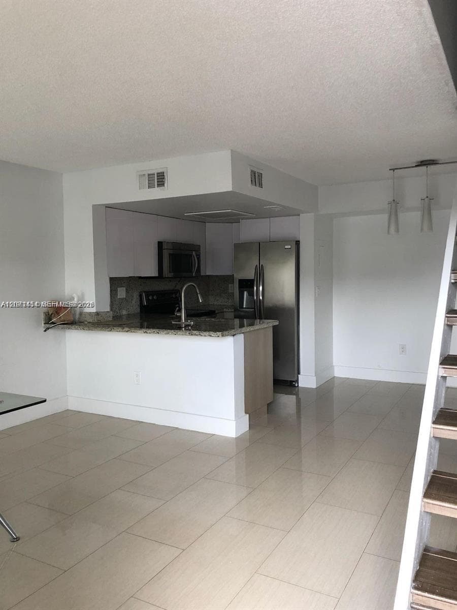 8670 NW 6th Ln # 208, Miami FL 33126 photo 2