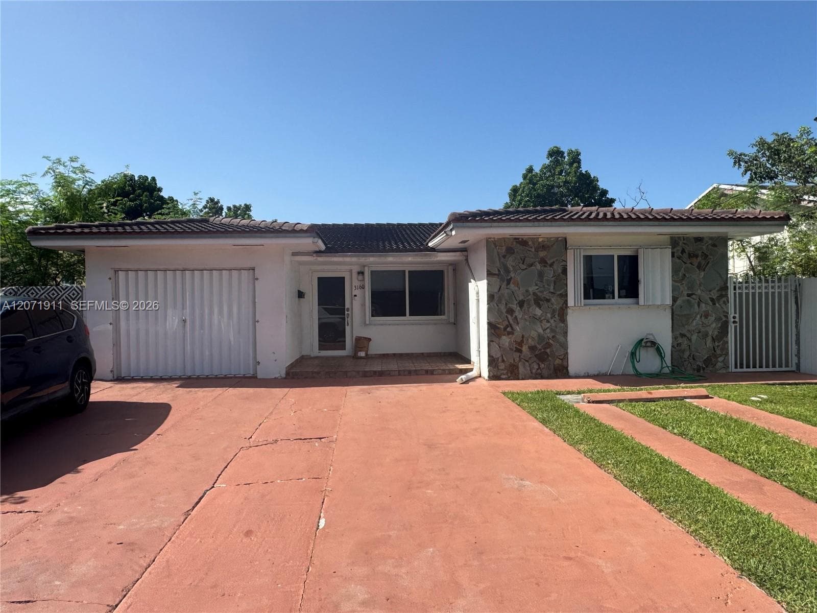 3160 NW 3rd St, Miami FL 33125