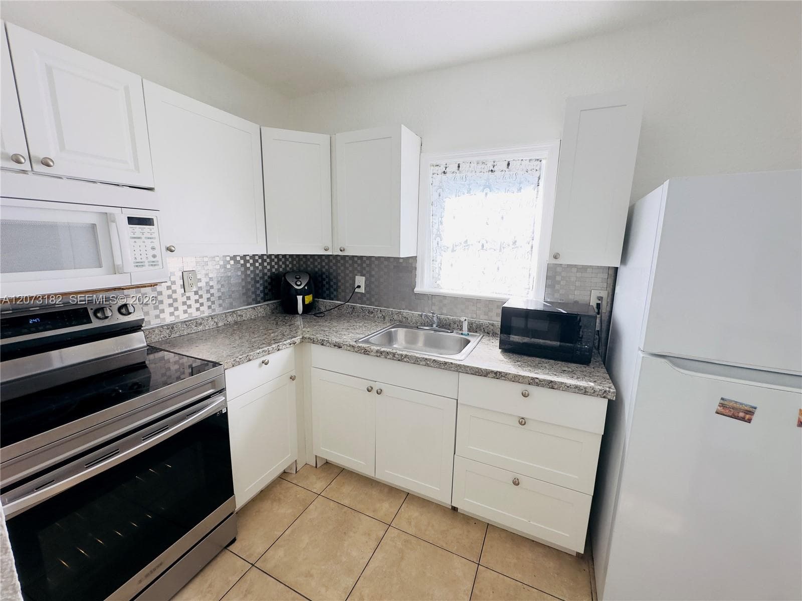 301 NW 37th St, Miami FL 33127 photo 3
