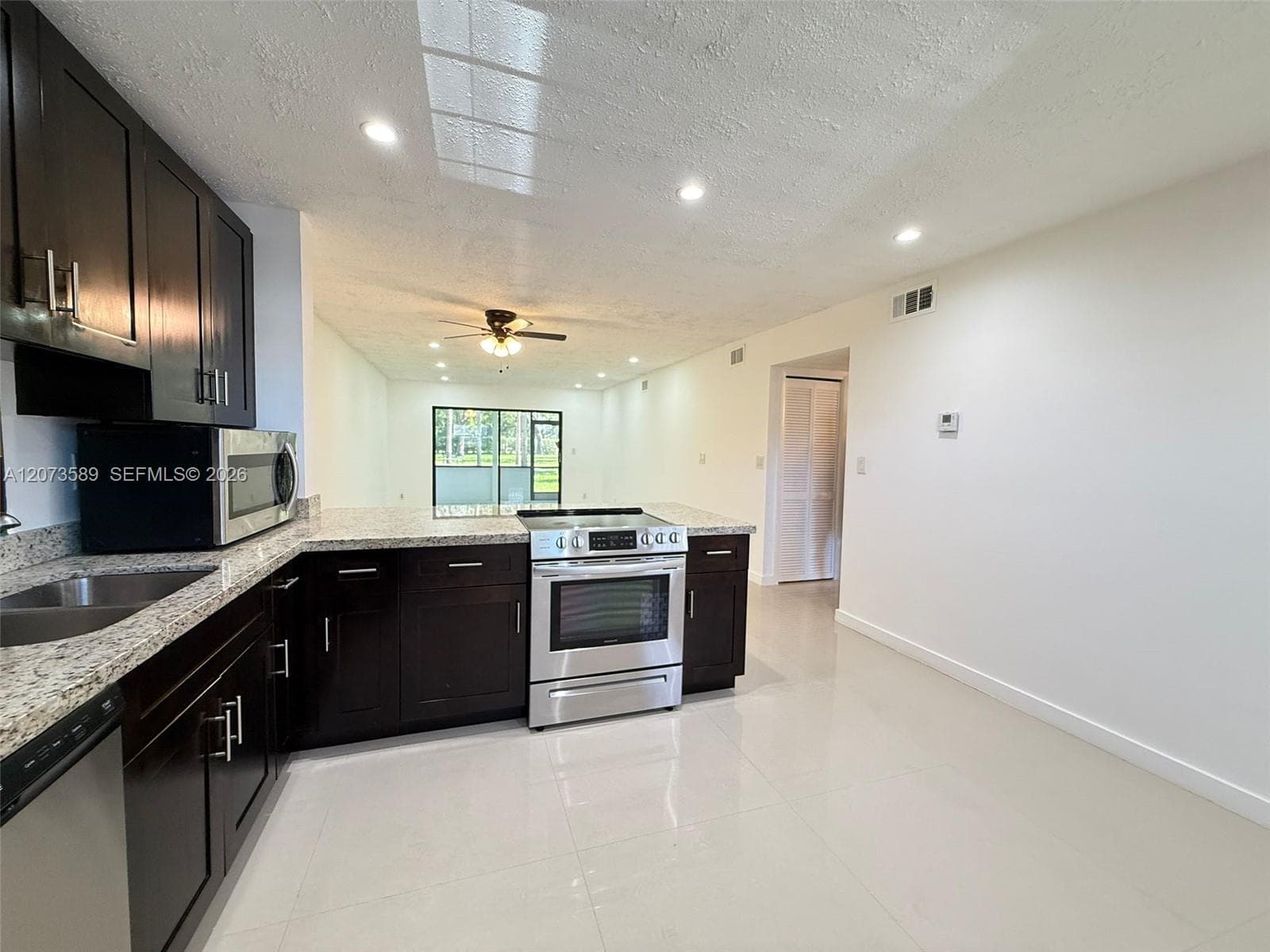 6095 N Sabal Palm Blvd # 103, Tamarac FL 33319