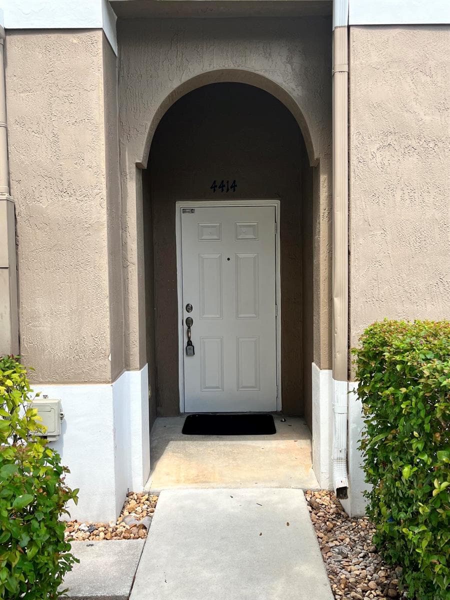 4414 WOODLAND Circle, Tamarac FL 33319 photo 2