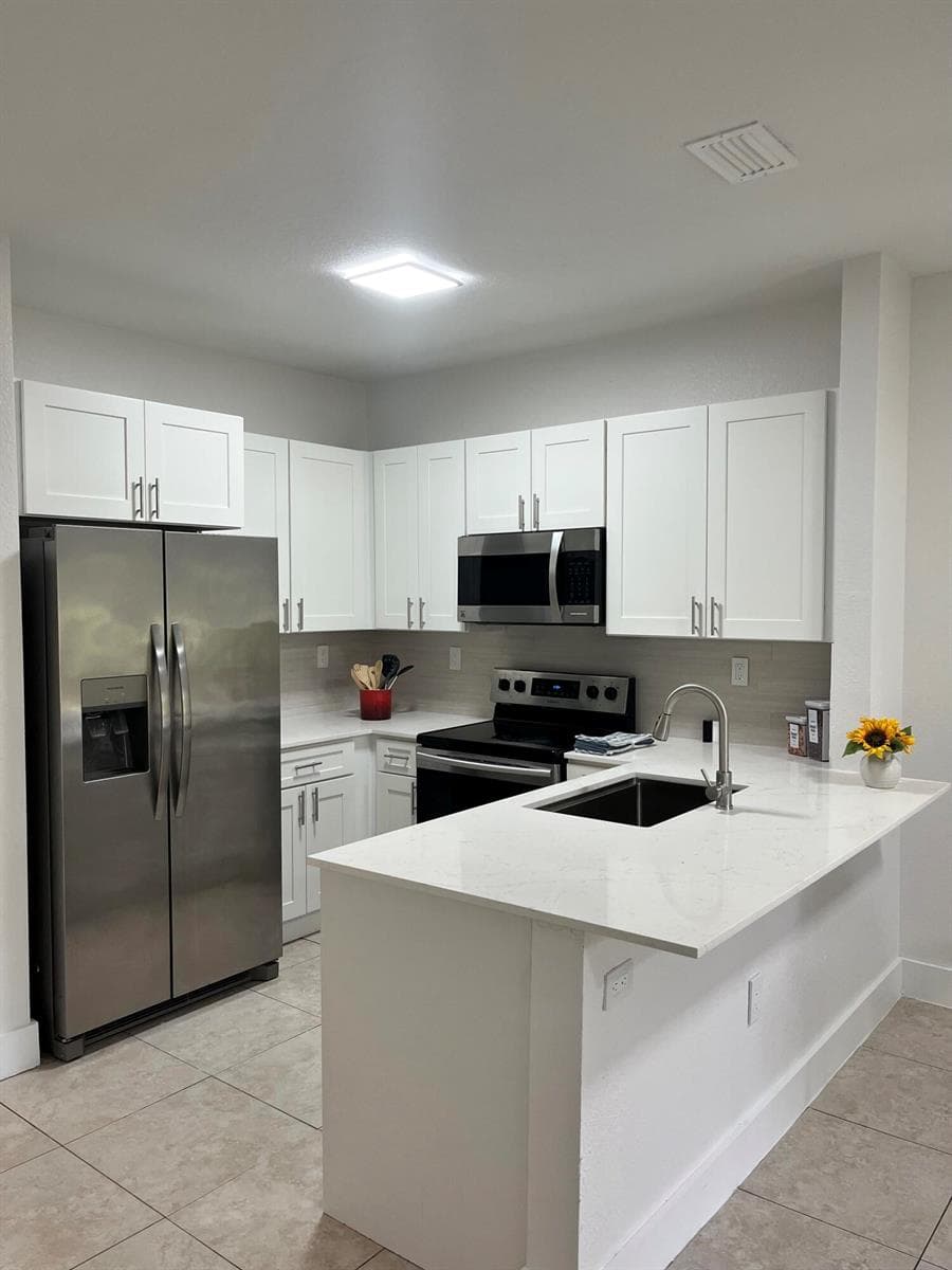 4414 WOODLAND Circle, Tamarac FL 33319 photo 5