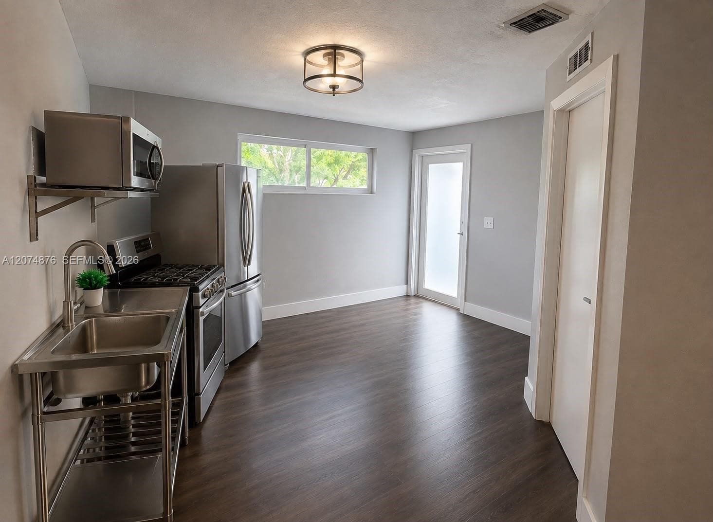 586 NW 48th St # 1, Miami FL 33127 photo 3