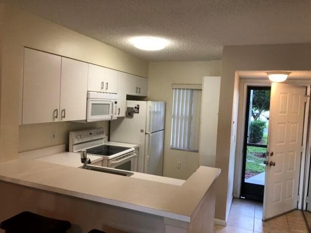2236 N CYPRESS BEND Drive # 106, Pompano Beach FL 33069 photo 3