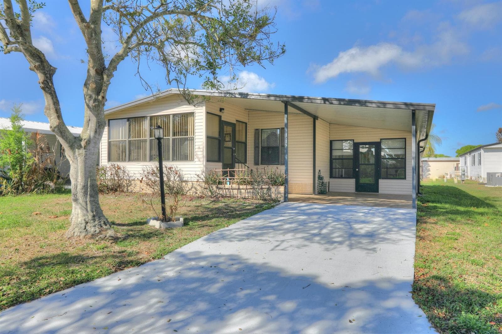 1212 Paurotis Drive, Barefoot Bay FL 32976 photo 2