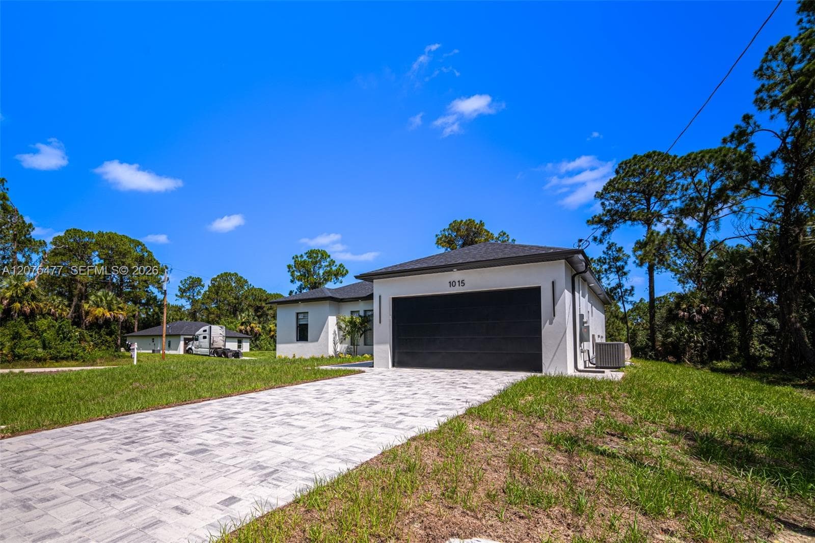 1015 E BAGGET ST, Lehigh Acres FL 33974 photo 4