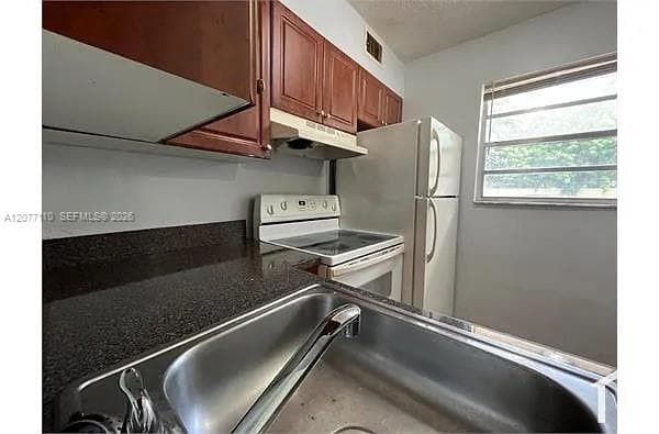 3380 NW 30th St # 24, Lauderdale Lakes, FL 33311 photo 3